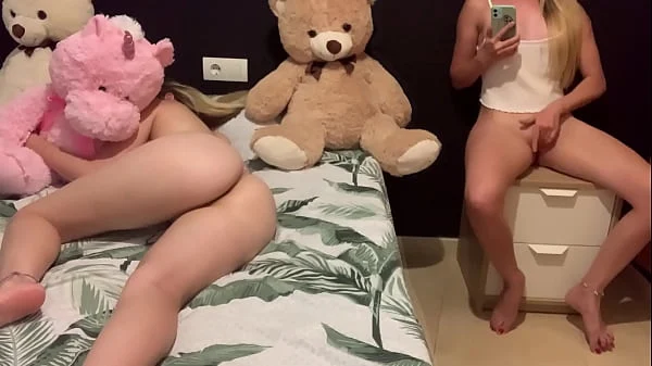 Teen touches her vagina with her stepsister next to her